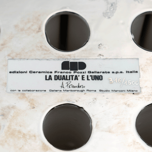 Arnolodo Pomodoro Sculpture